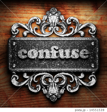 confuse word of iron on wooden background confuse word of iron on wooden background 14551539