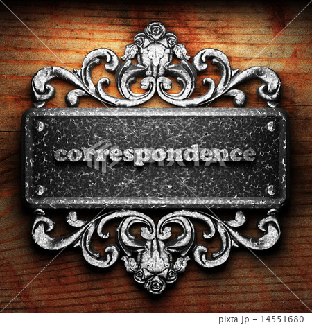 correspondence word of iron on wooden background 14551680