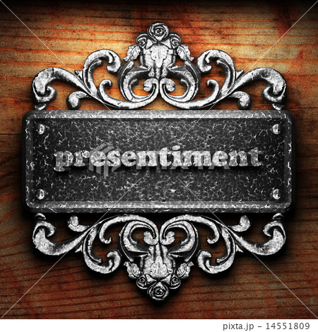 presentiment word of iron on wooden background 14551809