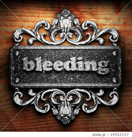 bleeding word of iron on wooden background 14552137