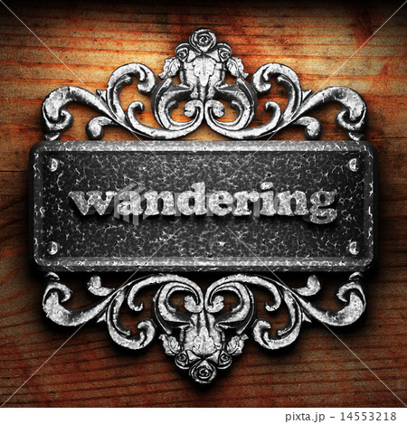 wandering word of iron on wooden background 14553218