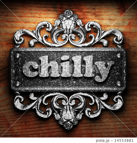 chilly word of iron on wooden background 14553881