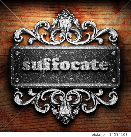 suffocate word of iron on wooden background 14554103