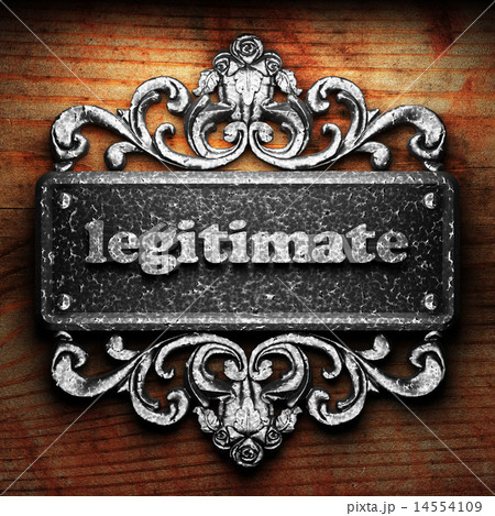 legitimate word of iron on wooden background 14554109