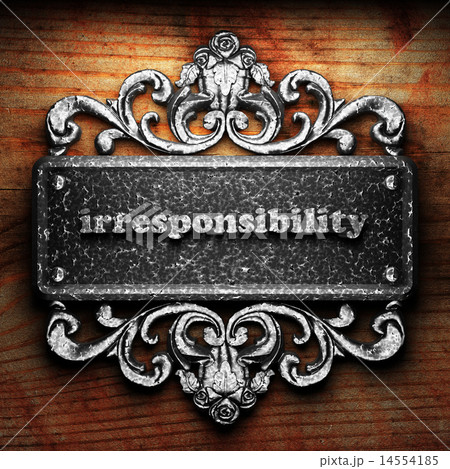 irresponsibility word of iron on wooden background 14554185