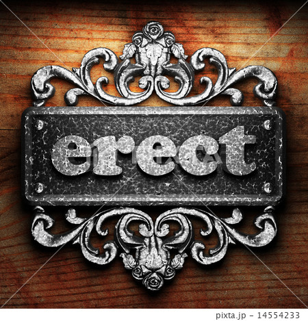erect word of iron on wooden background 14554233