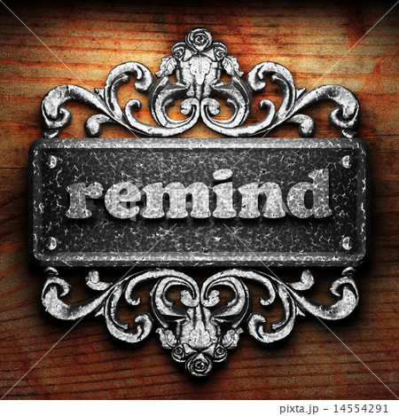 remind word of iron on wooden background 14554291