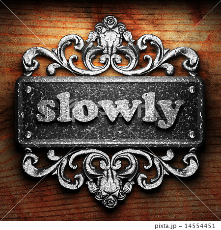 slowly word of iron on wooden background slowly word of iron on wooden background 14554451