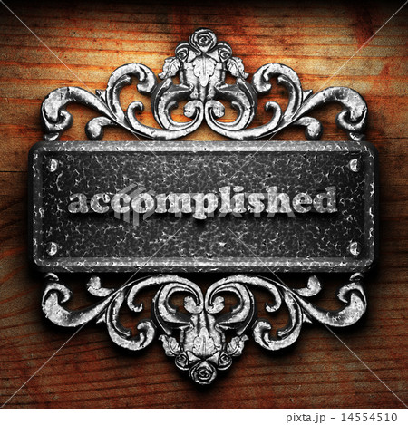 accomplished word of iron on wooden background 14554510
