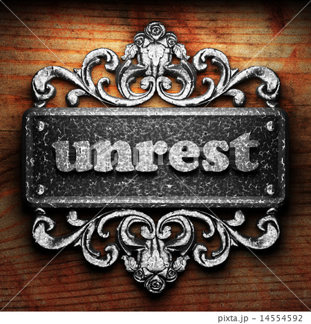 unrest word of iron on wooden background 14554592