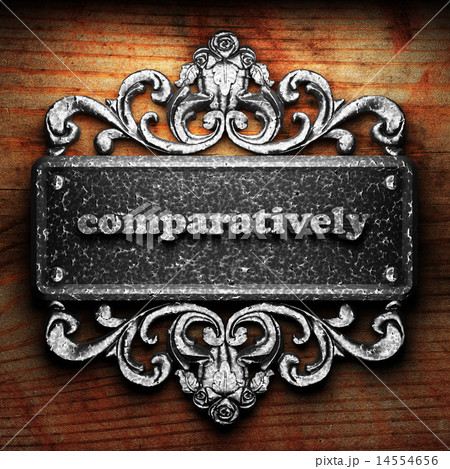 comparatively word of iron on wooden background 14554656