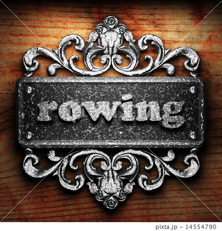 rowing word of iron on wooden background rowing word of iron on wooden background 14554790