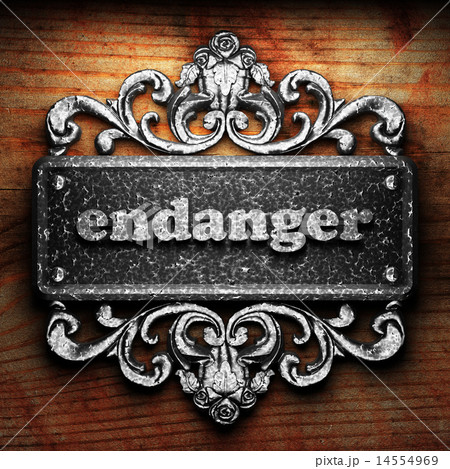 endanger word of iron on wooden background endanger word of iron on wooden background 14554969