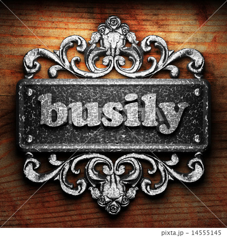 busily word of iron on wooden background busily word of iron on wooden background 14555145