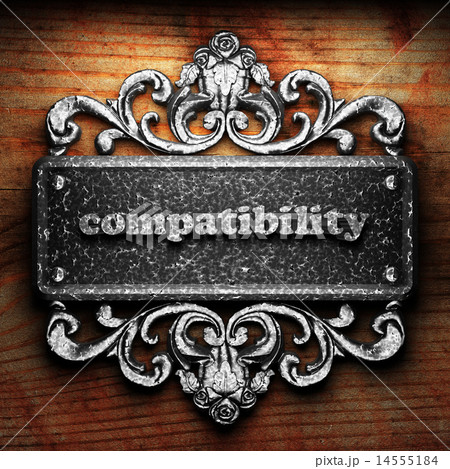 compatibility word of iron on wooden background 14555184