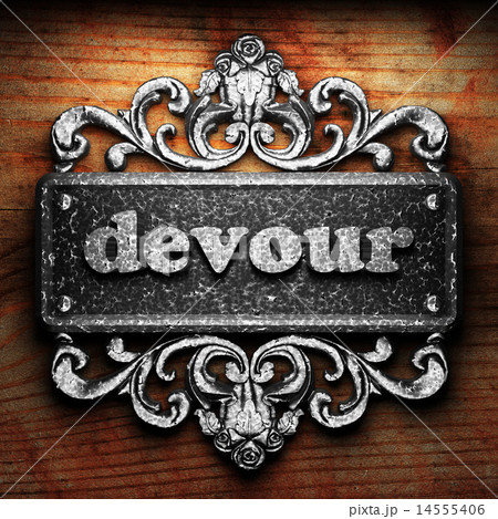 devour word of iron on wooden background 14555406