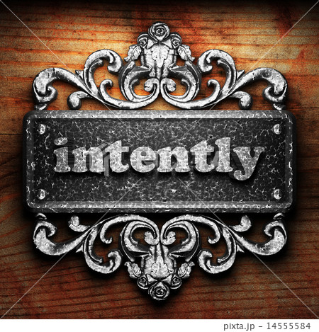intently word of iron on wooden background 14555584