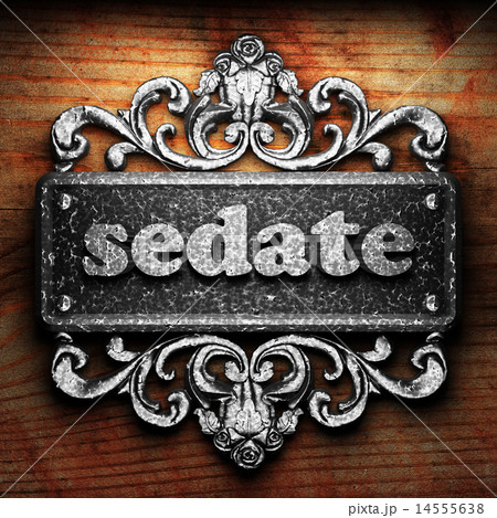 sedate word of iron on wooden background 14555638