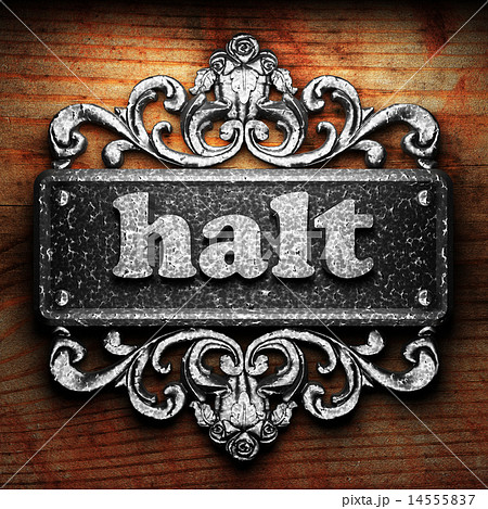 halt word of iron on wooden background 14555837