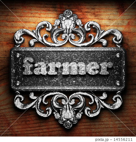 farmer word of iron on wooden background 14556211