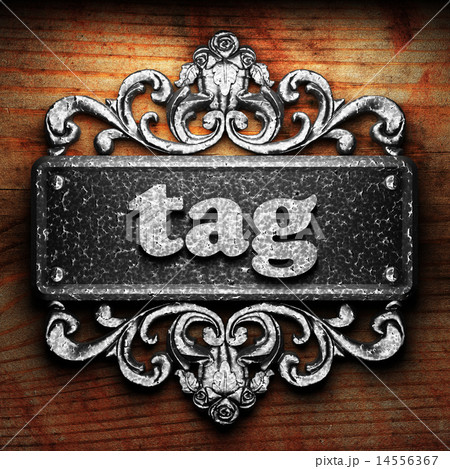 tag word of iron on wooden background 14556367