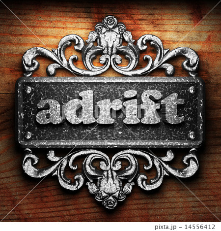 adrift word of iron on wooden background adrift word of iron on wooden background 14556412