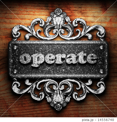 operate word of iron on wooden background 14556740