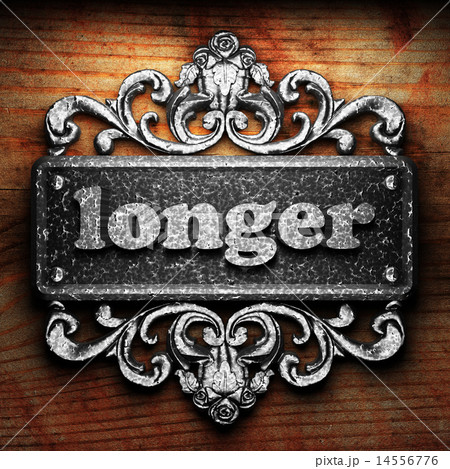 longer word of iron on wooden background 14556776