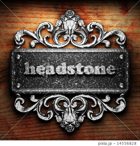 headstone word of iron on wooden background 14556828