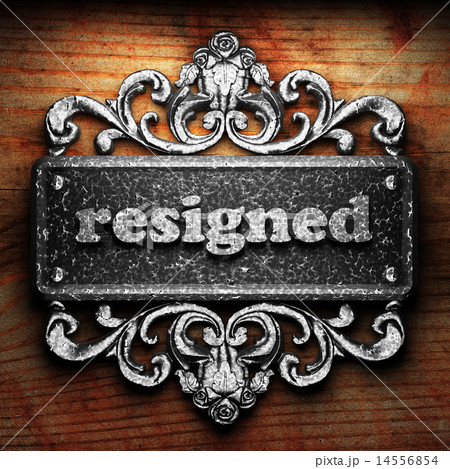resigned word of iron on wooden background resigned word of iron on wooden background 14556854