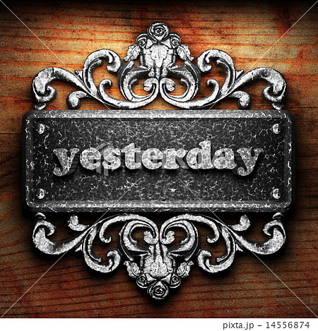 yesterday word of iron on wooden background 14556874