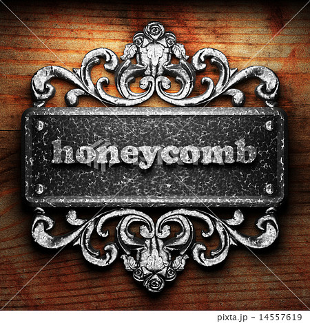 honeycomb word of iron on wooden background honeycomb word of iron on wooden background 14557619