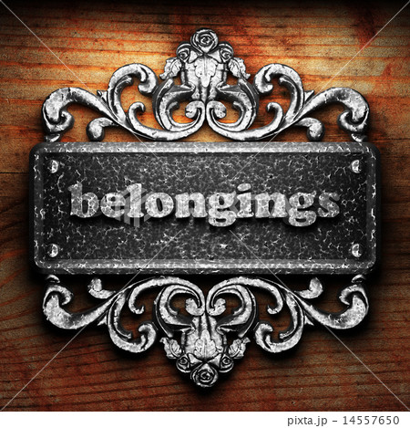 belongings word of iron on wooden background belongings word of iron on wooden background 14557650
