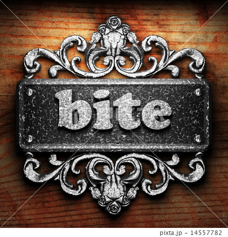 bite word of iron on wooden background 14557782