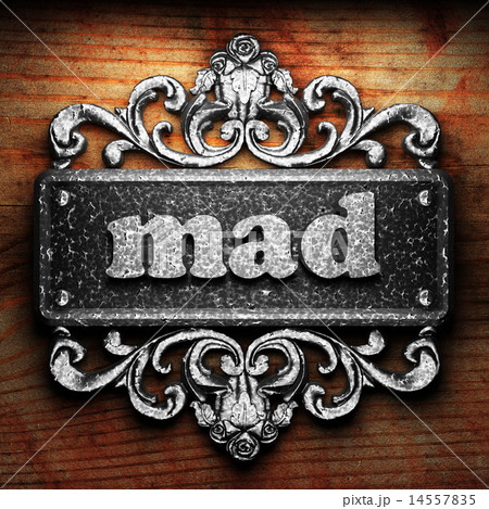 mad word of iron on wooden background 14557835