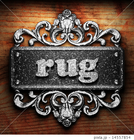 rug word of iron on wooden background 14557854
