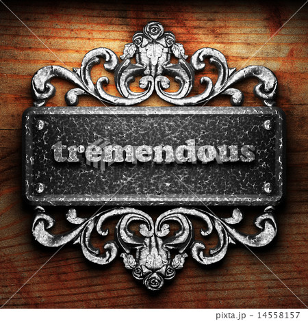 tremendous word of iron on wooden background tremendous word of iron on wooden background 14558157