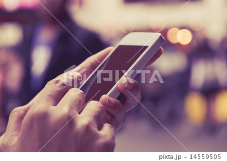 Woman Using a Smart Phone Woman Using a Smart Phone 14559505