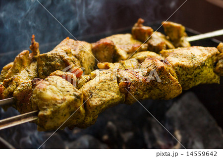 Fresh pork bbk meat cooking  outdoors 14559642