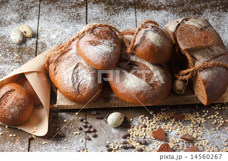 Variety of rye bread on a wooden background Variety of rye bread on a wooden background 14560267