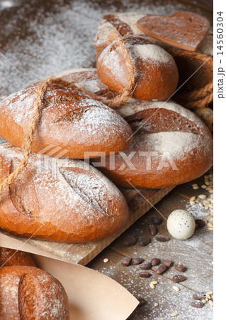 Variety of rye bread on a wooden background Variety of rye bread on a wooden background 14560304