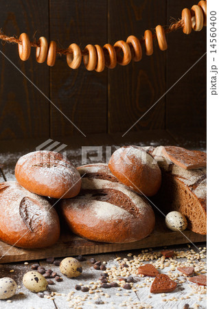 Variety of rye bread on a wooden background with milk Variety of rye bread on a wooden background with milk 14560400
