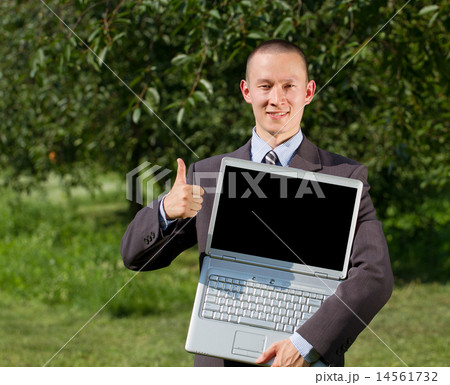 Man working outdoors as a freelancer Man working outdoors as a freelancer 14561732