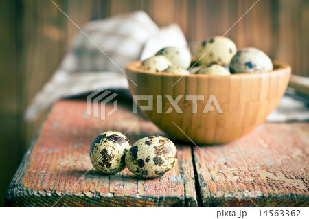 Quail eggs on old wooden table Quail eggs on old wooden table 14563362