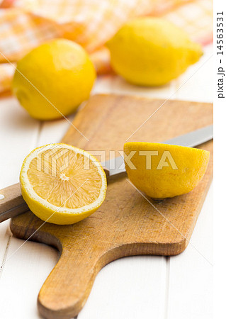 fresh lemon on kitchen table fresh lemon on kitchen table 14563531