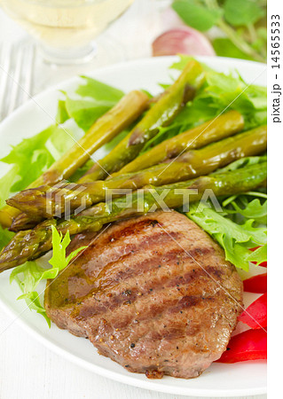 fried beef with boiled asparagus and salad fried beef with boiled asparagus and salad 14565533