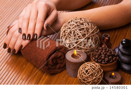 brown manicure on a bamboo background 14580301