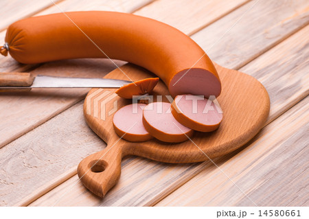tasty Boiled sausage on the cutting board. 14580661