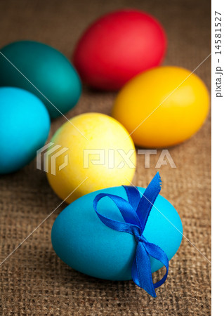 colored Easter eggs on the burlap background 14581527