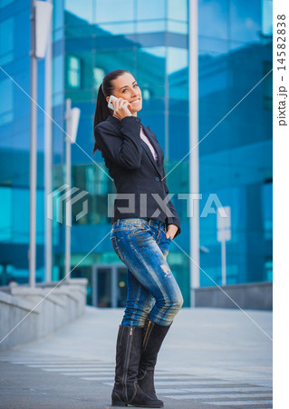 smiling girl, on the modern building background 14582838